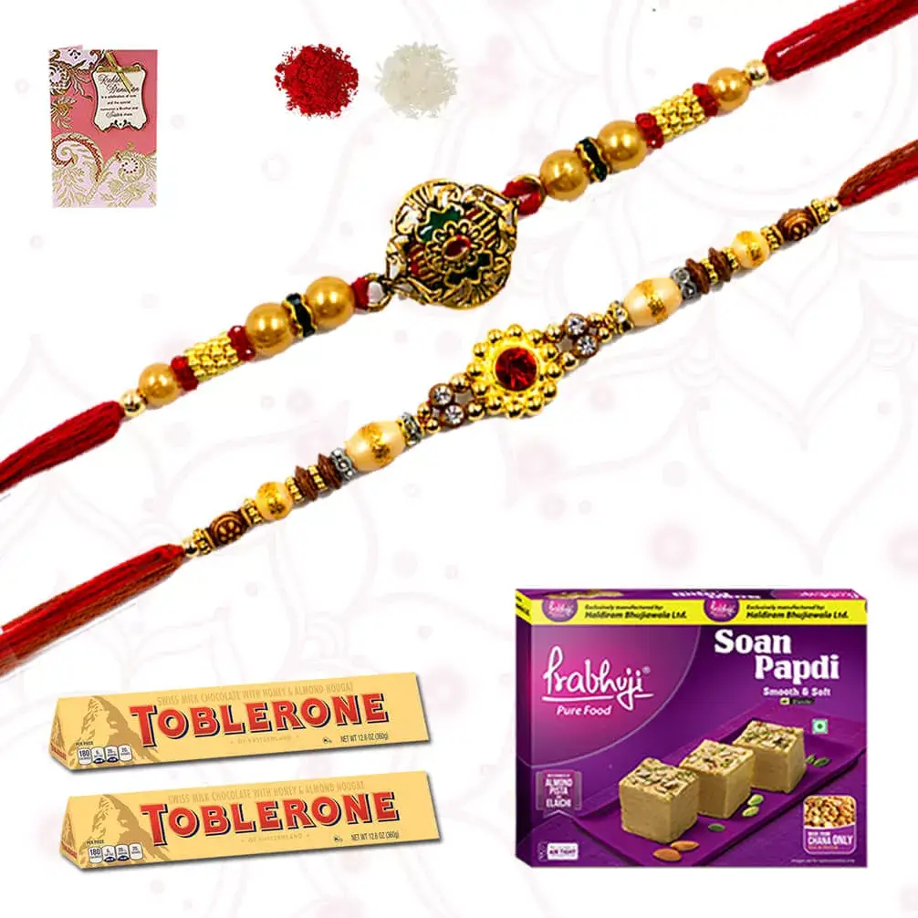 2 FAncy Rakhi with 2 Toblerone Chocolate bar with Soan PAdi sweets pack
