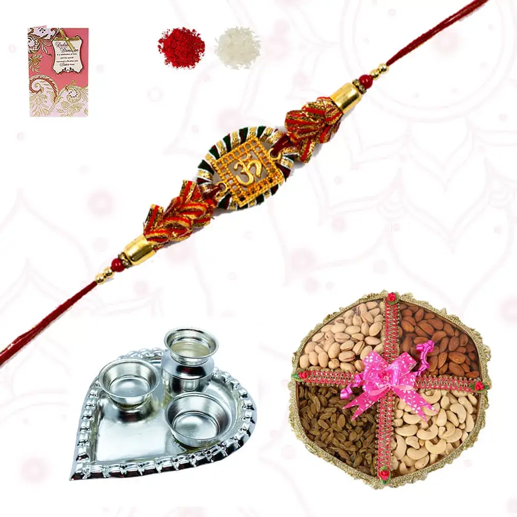 1 Om rakhi with Dryfruits Platter consisiting of Cashew, raisins, almonds and Apricots withHeart shape silver plated special puja thali